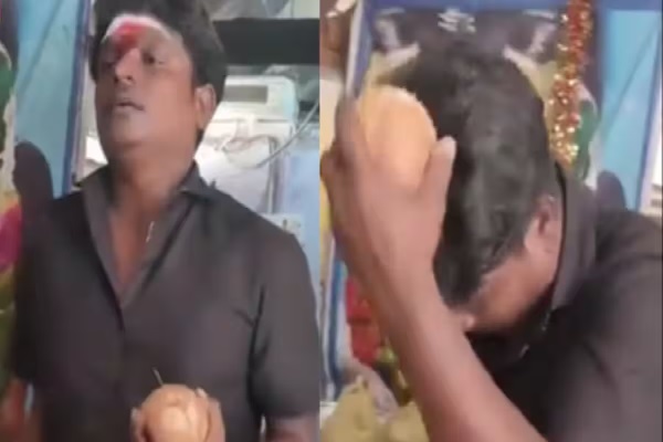You are currently viewing पूजा के दौरान स्टंट करना युवक को पड़ा भारी, सिर से फोड़ा नारियल फिर बेहोश होकर गिर पड़ा; देखें VIDEO